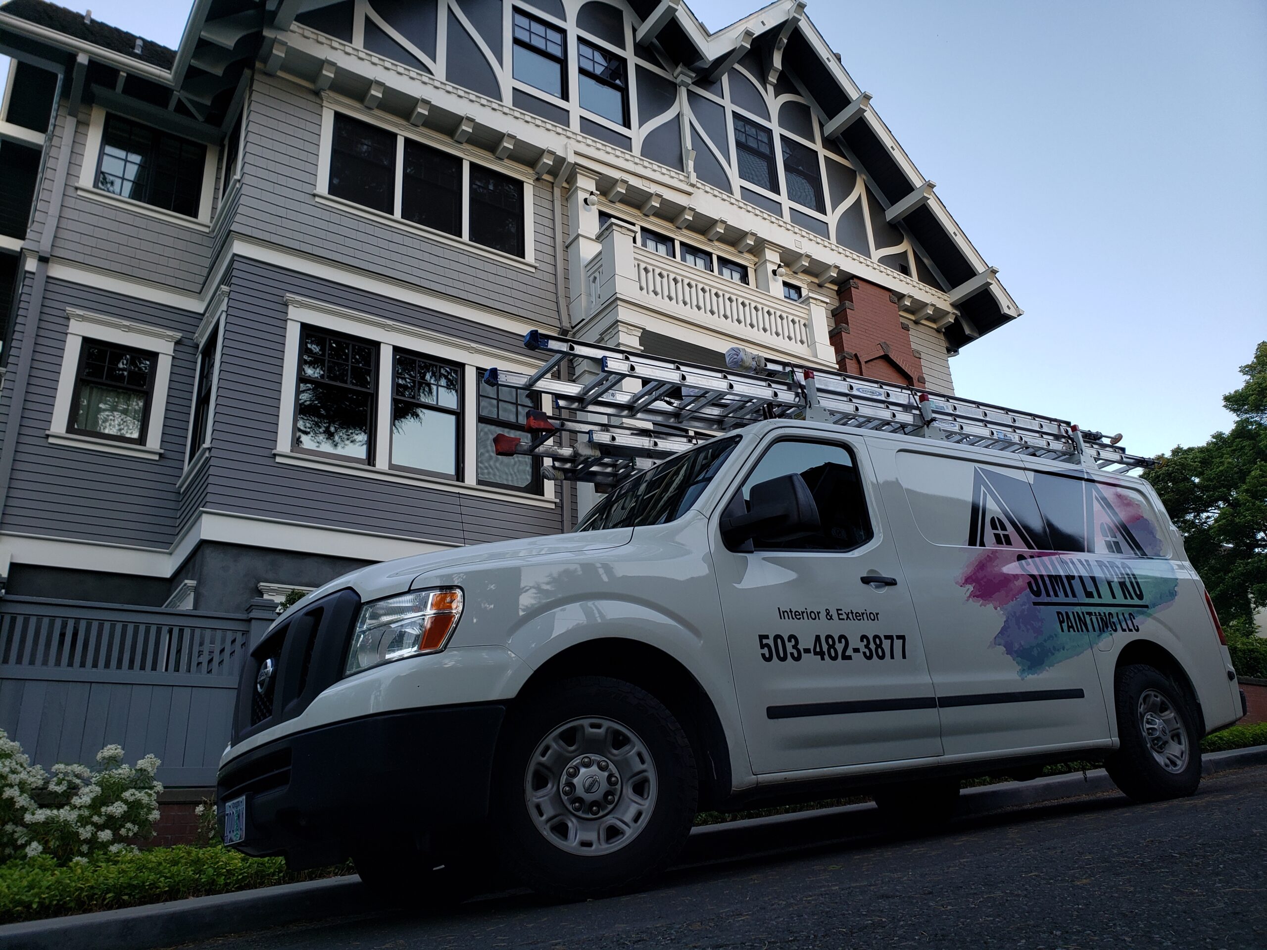 Simply Pro Painting LLC work van on location